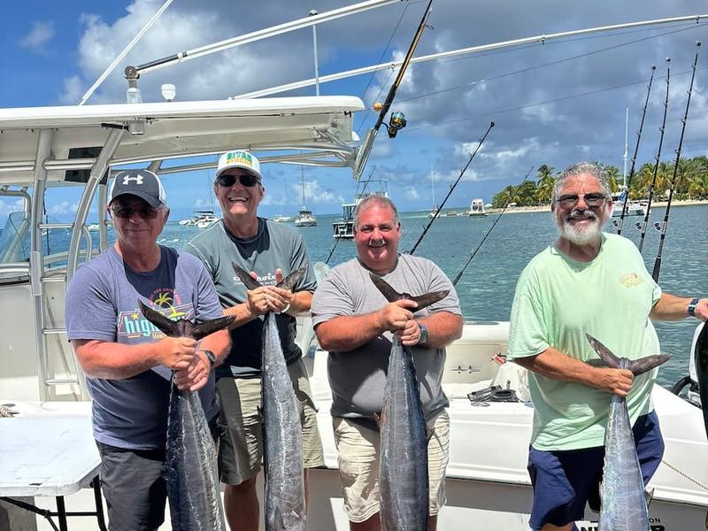 The crew at work on the back deck of a St. Croix charter boat