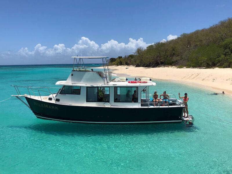 Mile Mark anchored off the beach at Buck Island