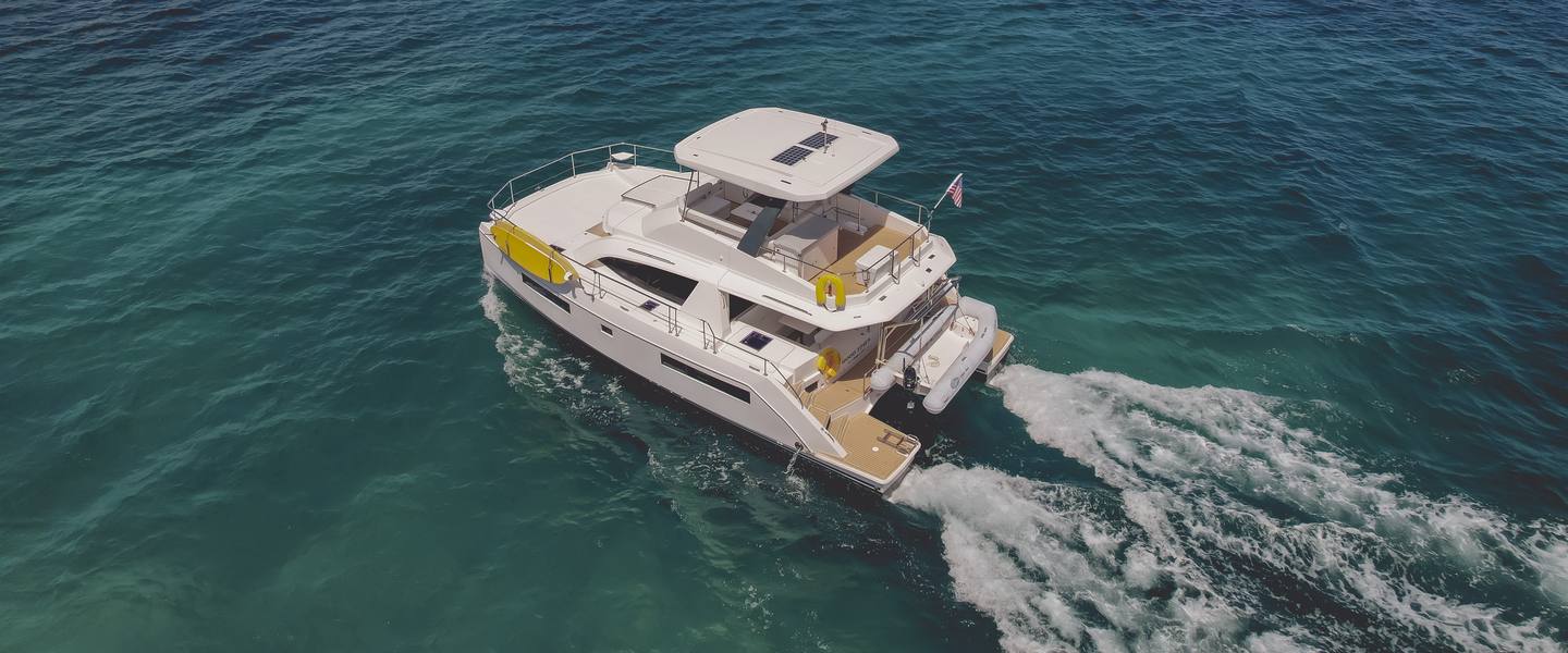 Aerial view of the Good Times power catamaran cruising off St. Croix