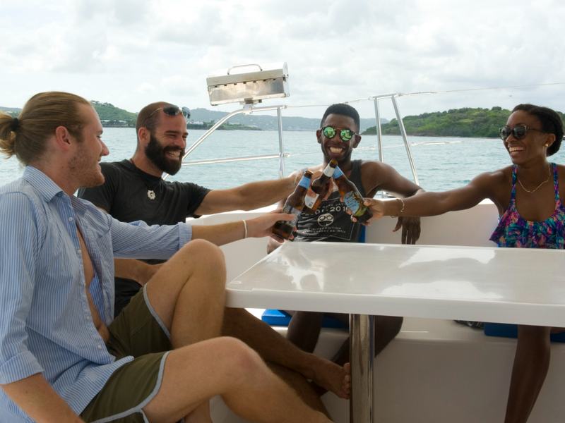 Guests relaxing on the deck of the Inconceivable catamaran